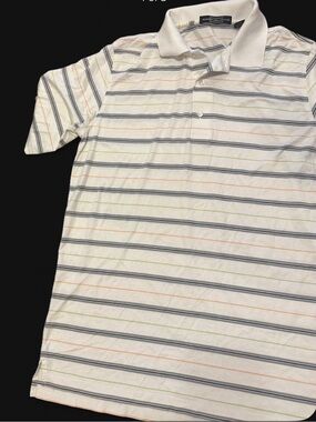 Carnoustie striped polo in a men’s Large! 🤍⛳️
